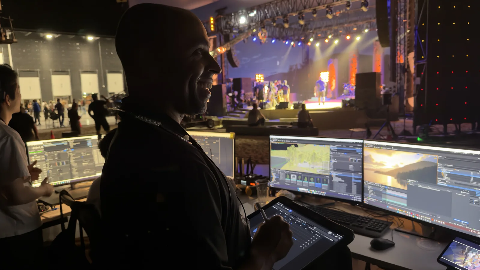 Marcus LeVere supervising virtual production on set, beside real-time scene monitors