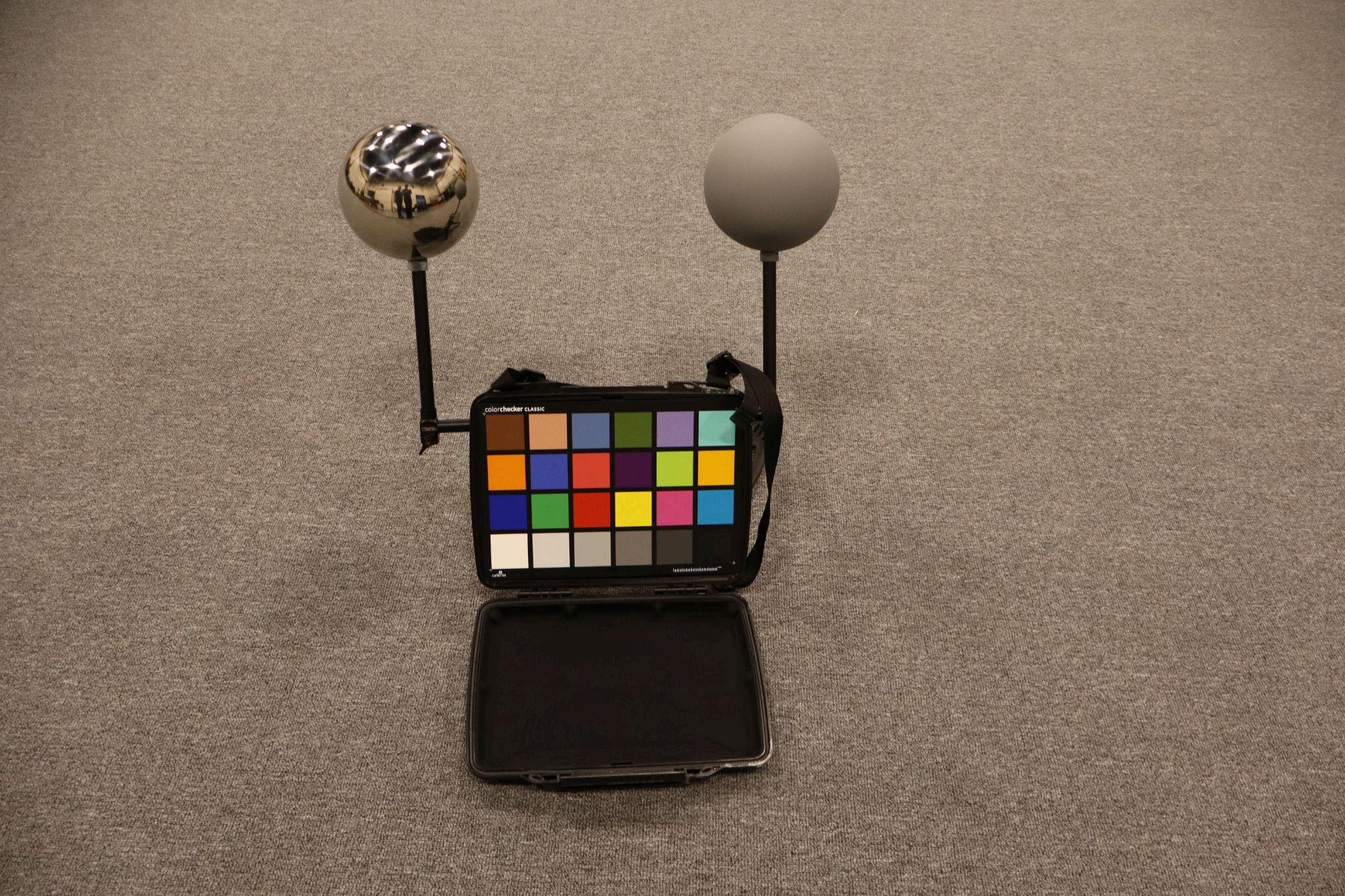 Chrome sphere, grey sphere and color chart in the finished VFX reference kit